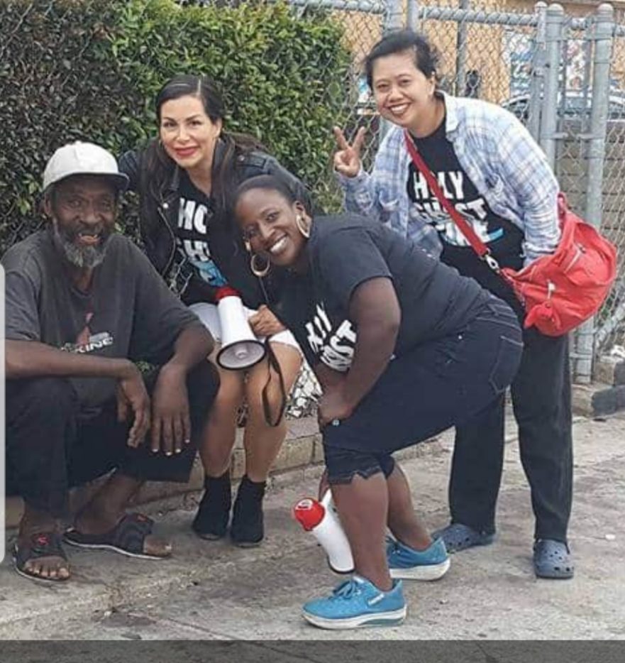 A group of people posing for the camera.